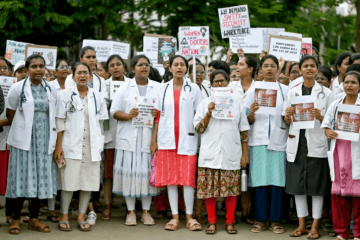 a group of people holding signs